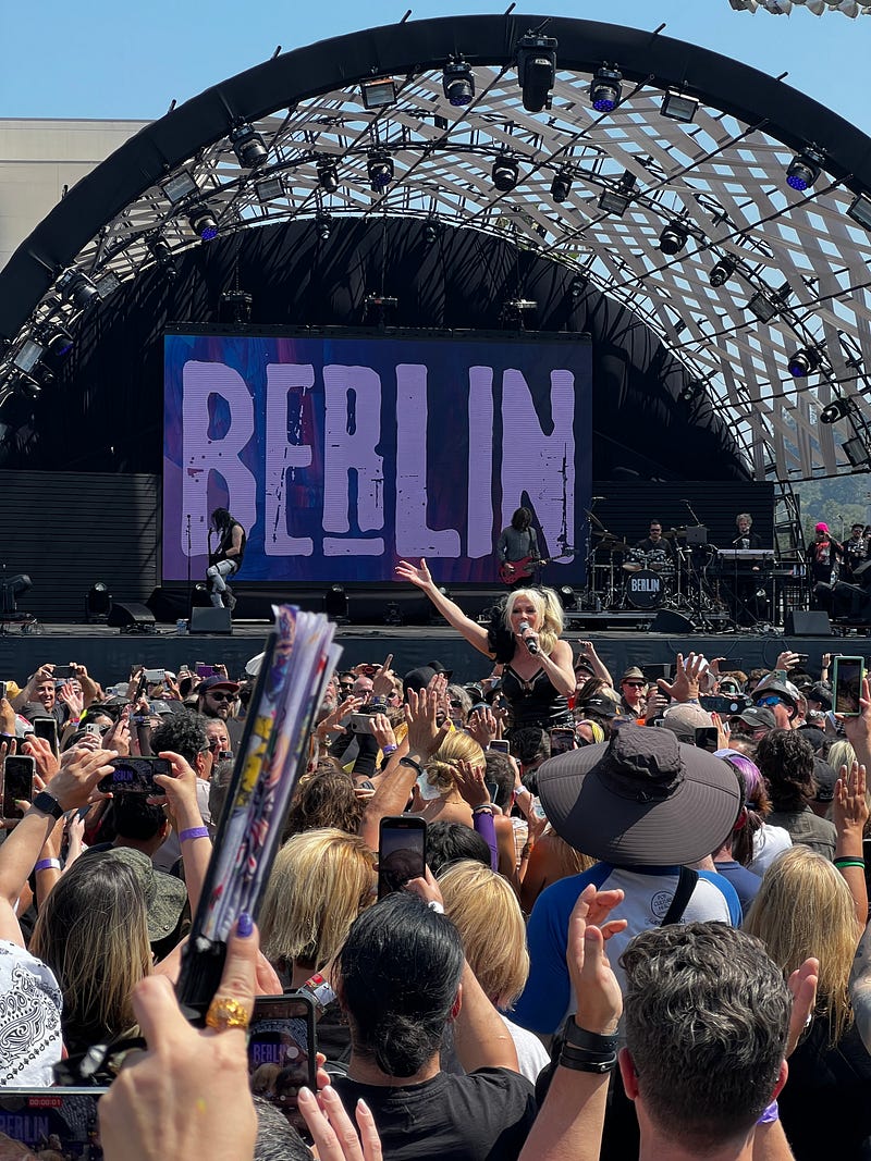 Terri Nunn of Berlin singing among the crowd at Cruel World Festival