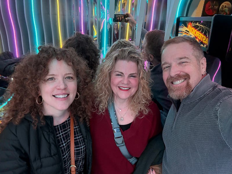 Jennifer, Jen, and Andrew outside Pend Oreille Pavilion for Straight No Chaser