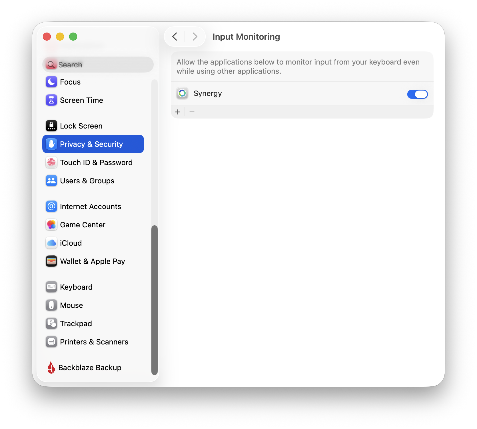 macOS Privacy & Security settings showing Synergy enabled under Input Monitoring